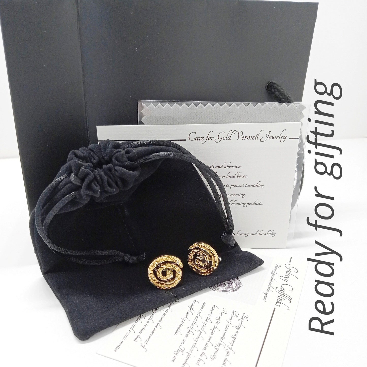 Handmade galaxy cufflinks in gold vermeil and sterling silver displayed with jewelry pouch and packaging, artisan luxury men's accessory gift